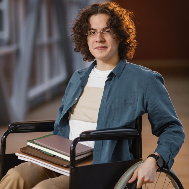 portrait-smiley-student-wheelchair portrait-smiley-student-wheelchair